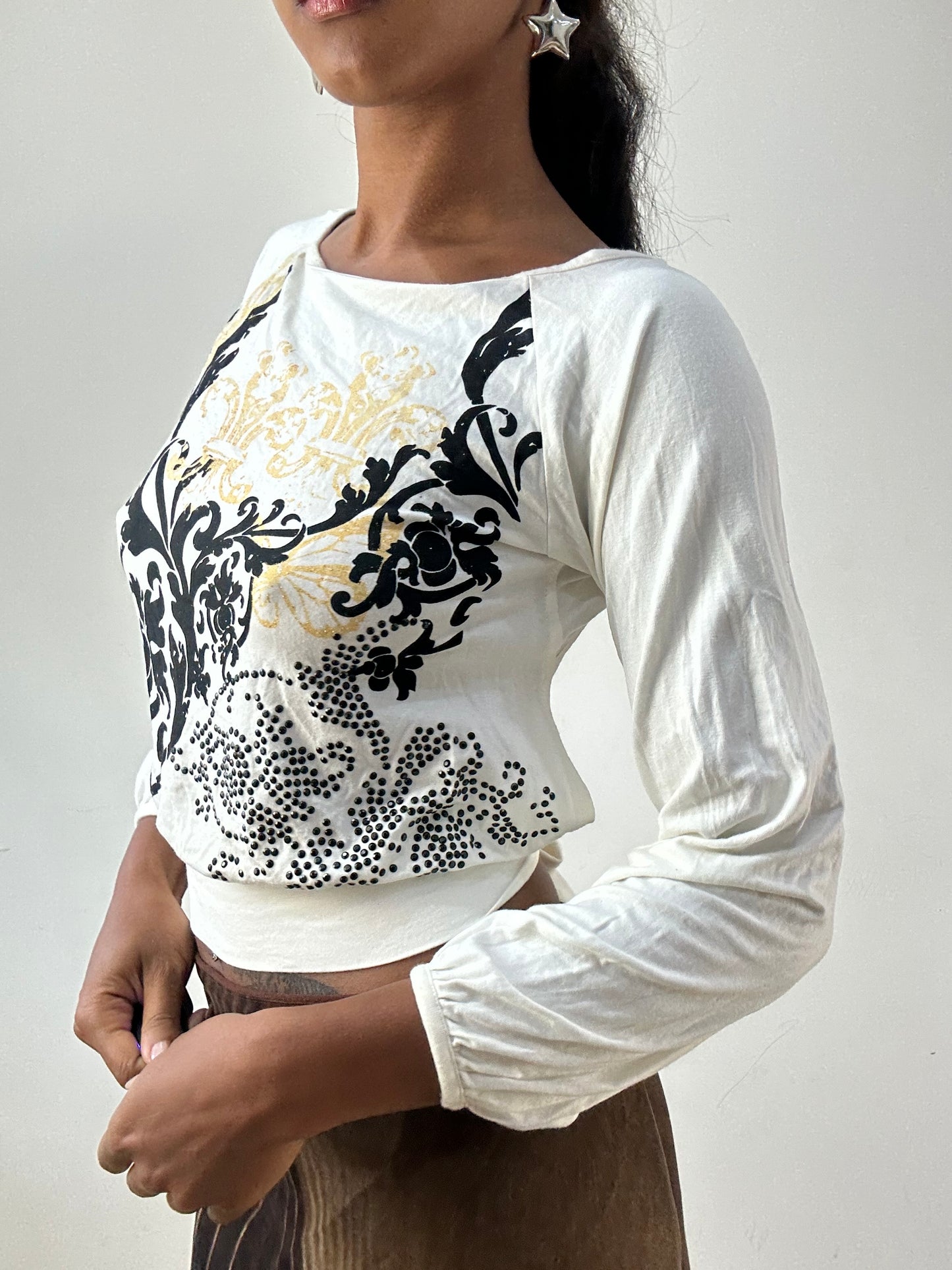 BEST PICKS | medium white long sleeve top with graphic print