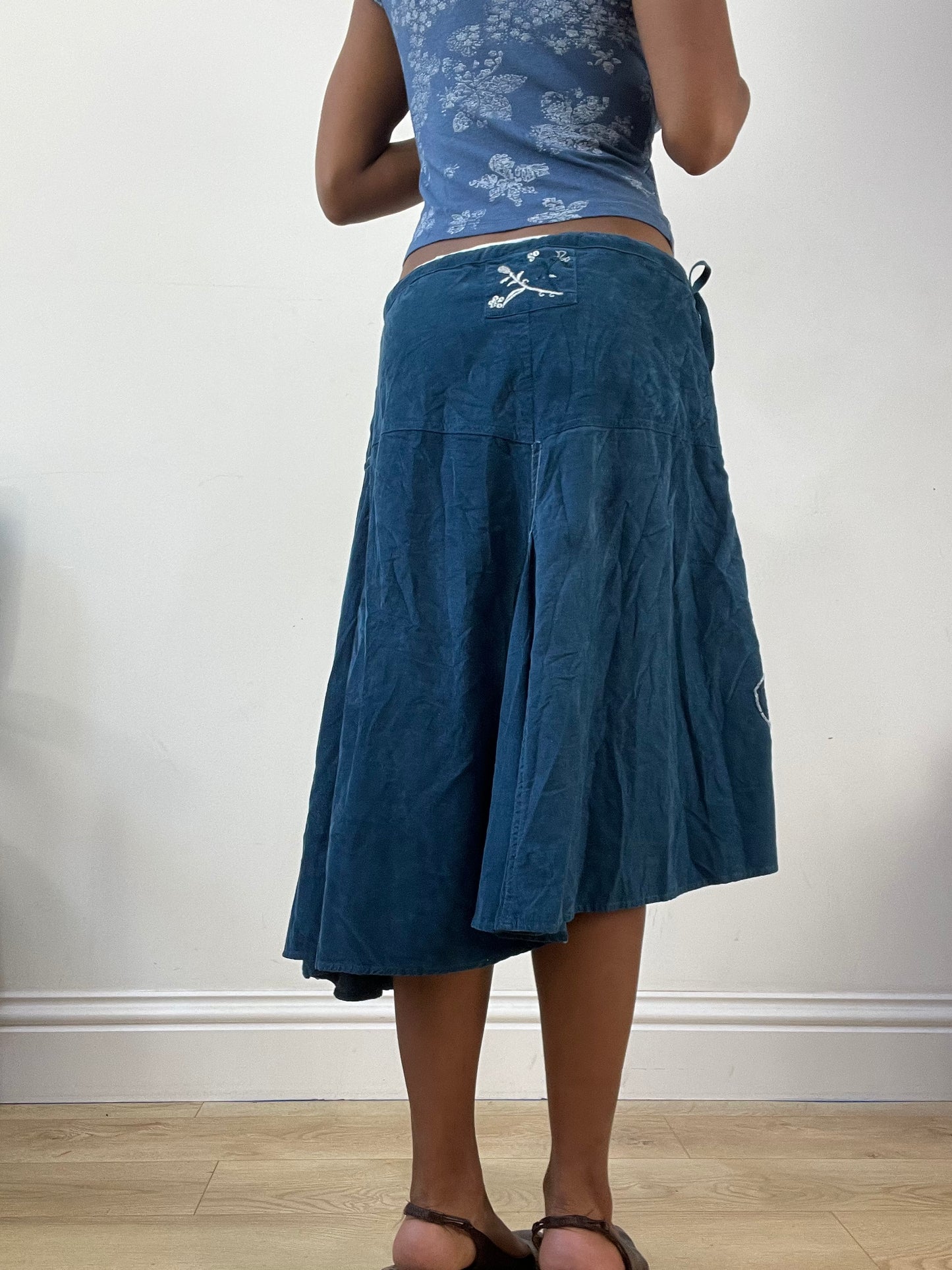 AUTUMN EDIT | medium blue asymmetric midi skirt with floral embroidery