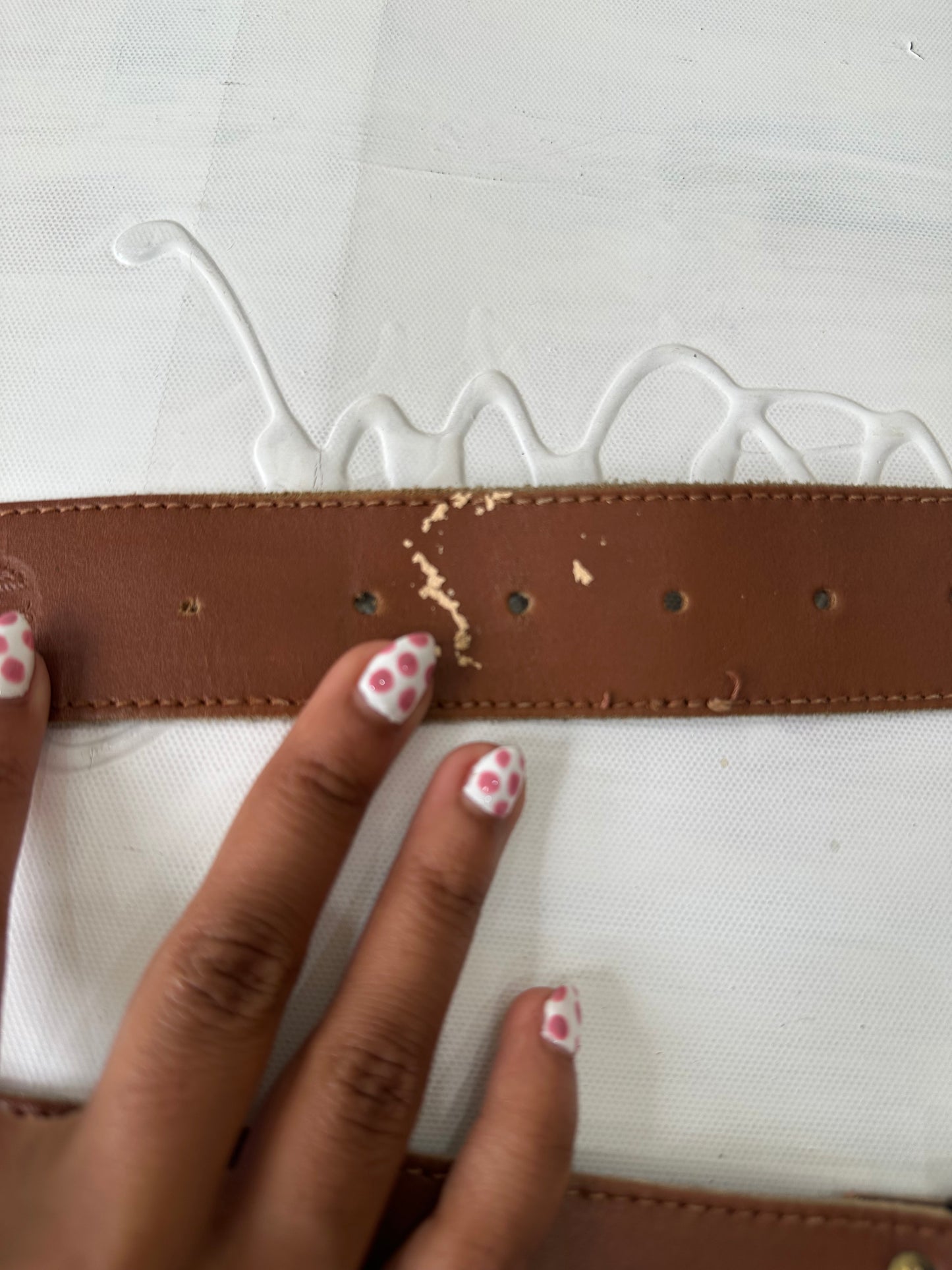 vintage edit twenty-seven | brown and silver buckle belt with floral embossing detail