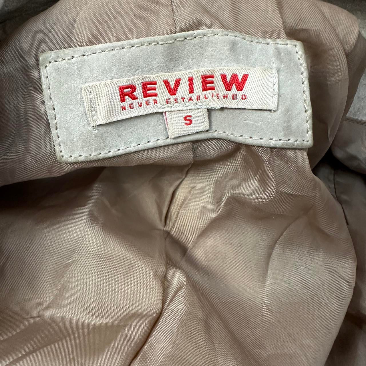 small beige leather zip jacket
