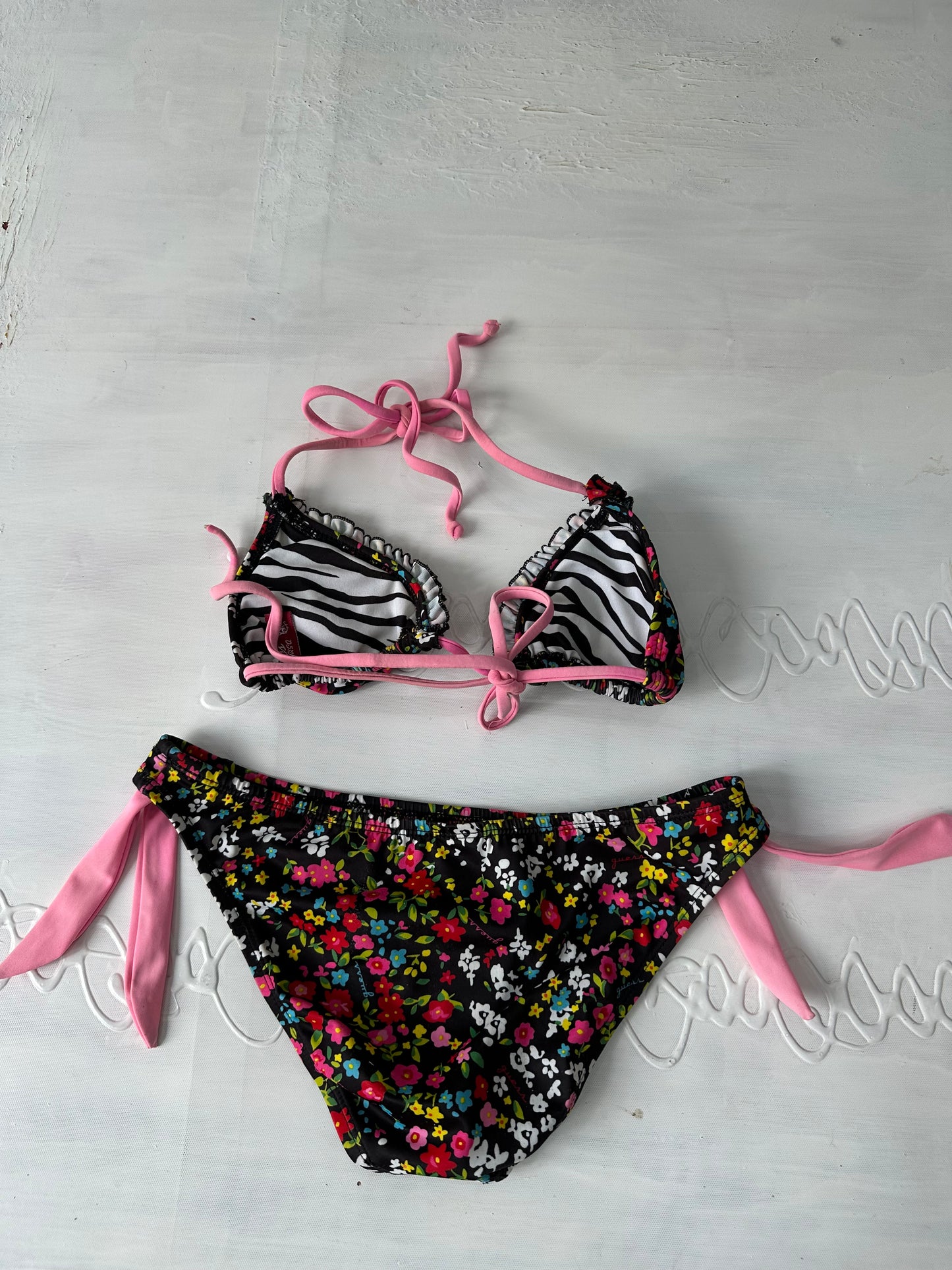 vintage edit thirty-one | small black floral bikini set with pink strap detail