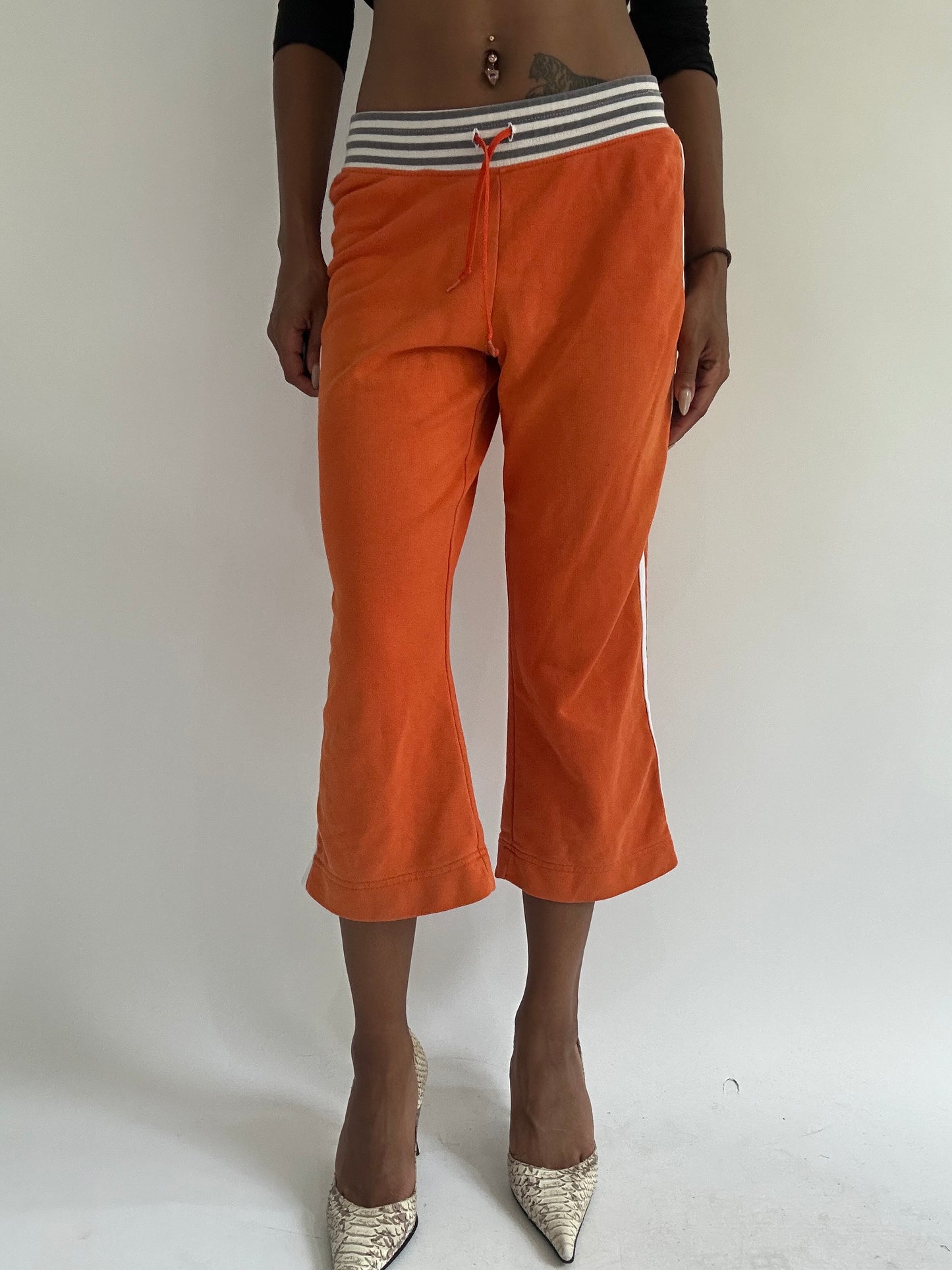 euro trash | small orange nike striped waist capri trousers