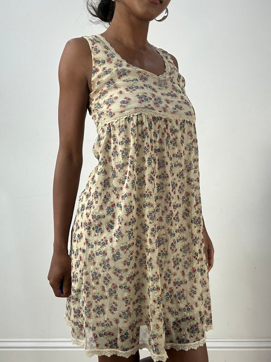 LFW edit | small beige mesh overlay midi dress with floral print