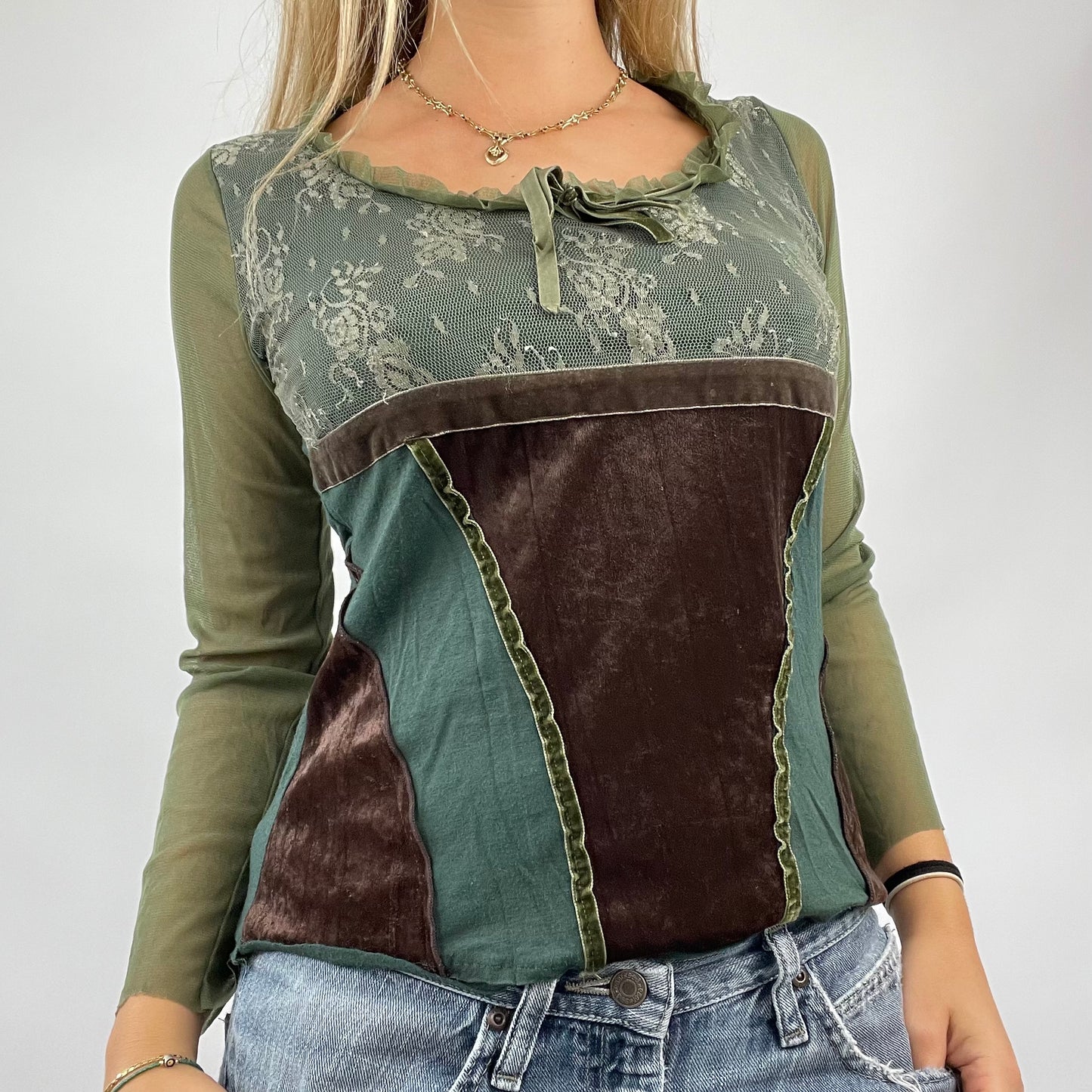 GRUNGE COQUETTE DROP | small green long sleeve top with mesh sleeves and lace detail