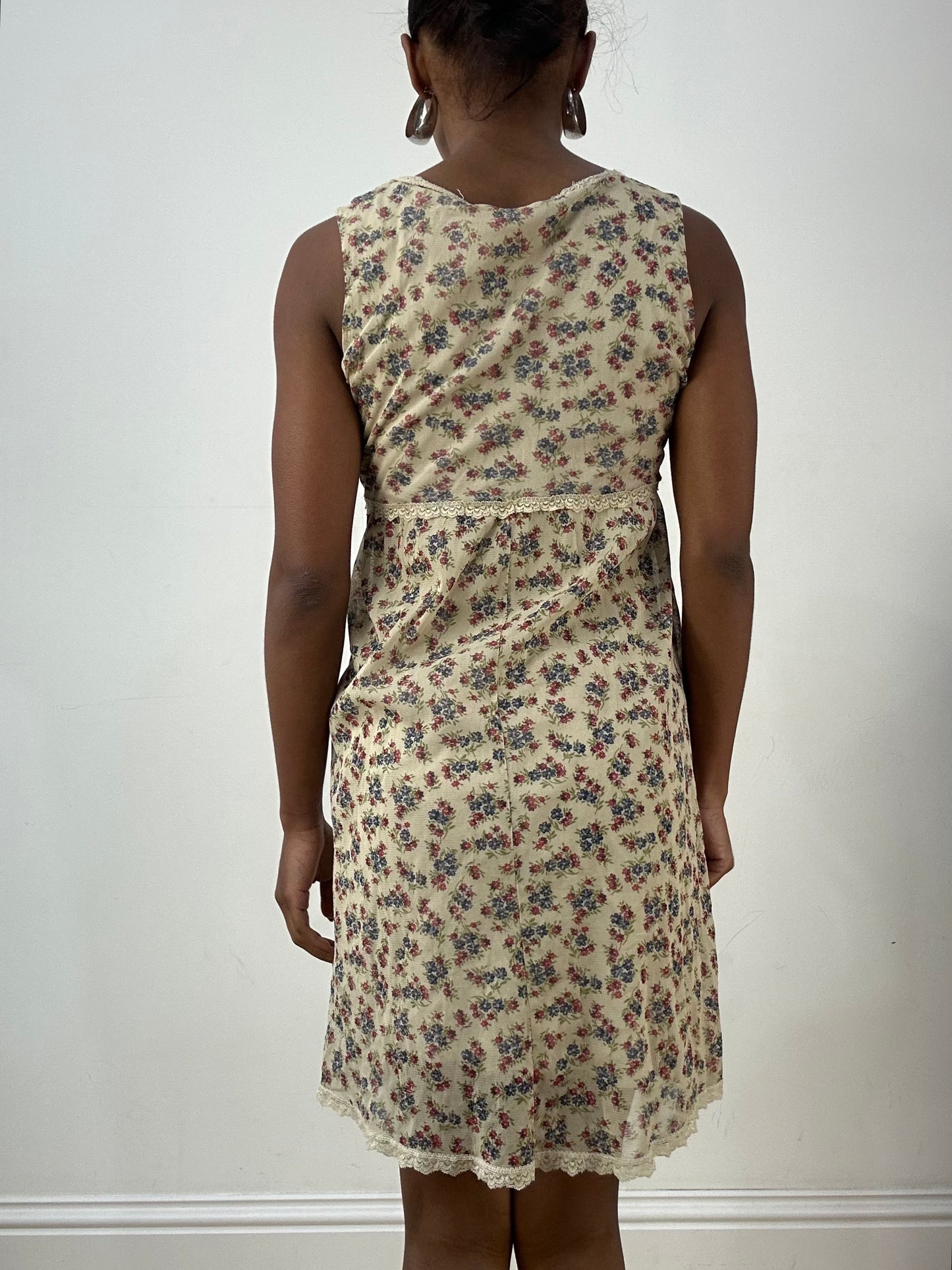 LFW edit | small beige mesh overlay midi dress with floral print