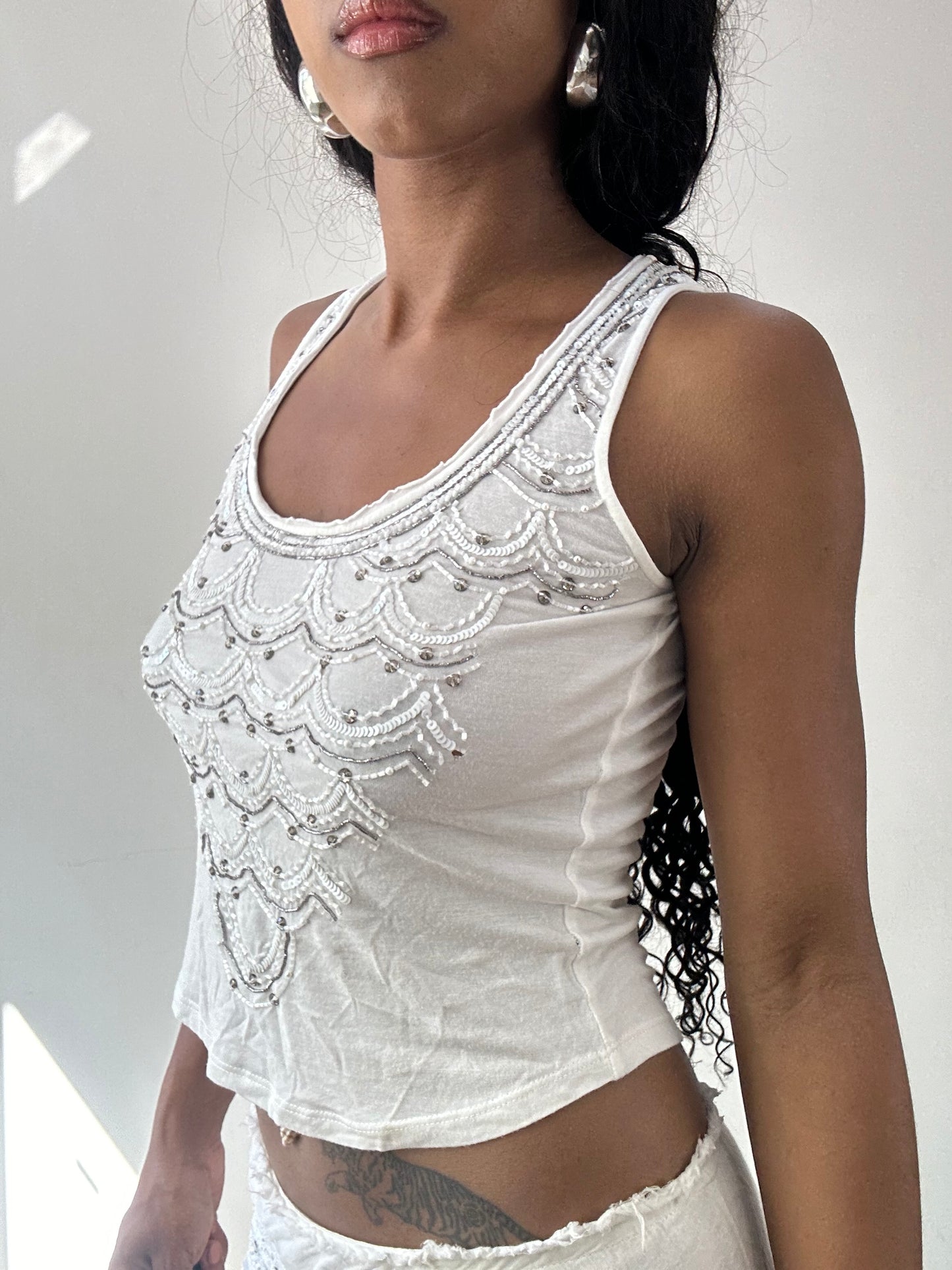 vintage edit twenty-five | small white jean's paul gaultier tank top with beading detail