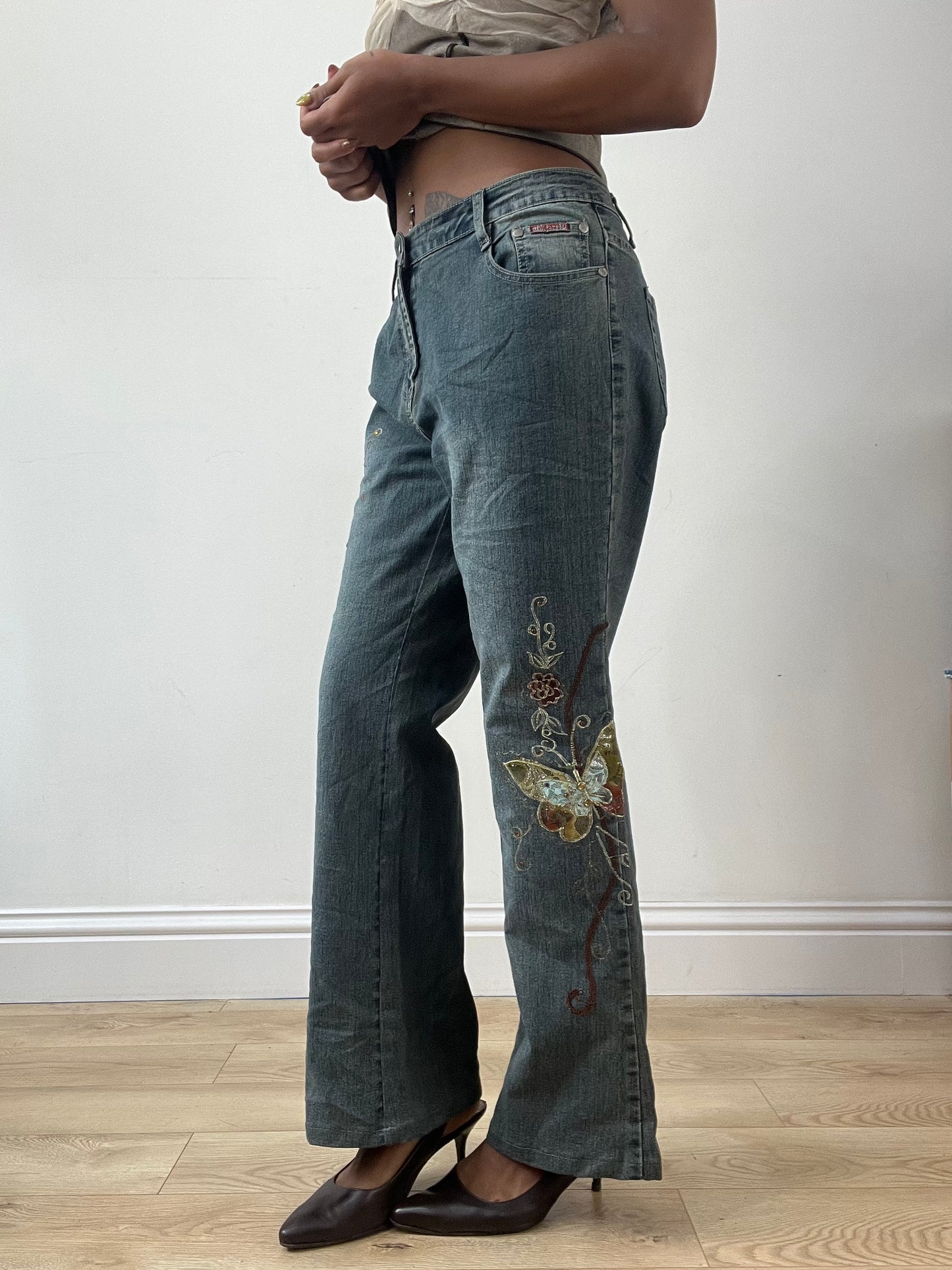 LFW edit | medium blue denim jeans with gold butterfly embroidery and rhinestones