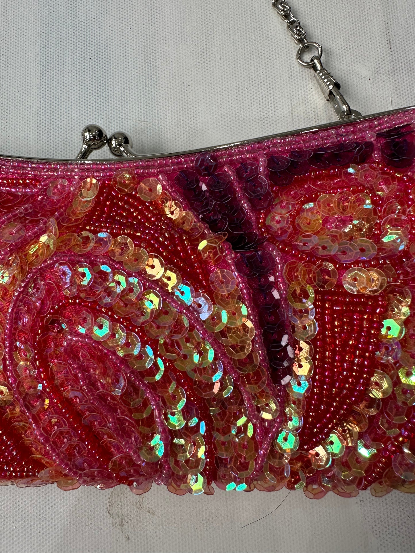 BEST PICKS | pink and purple shoulder bag with iridescent sequins