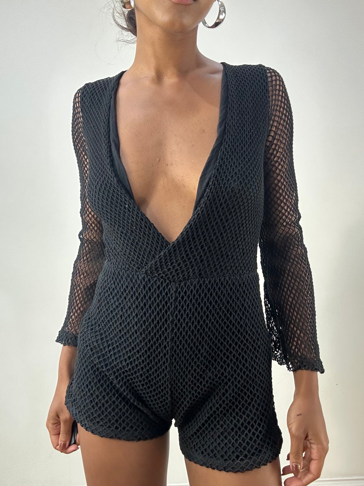 LFW edit | small black playsuit with fishnet overlay