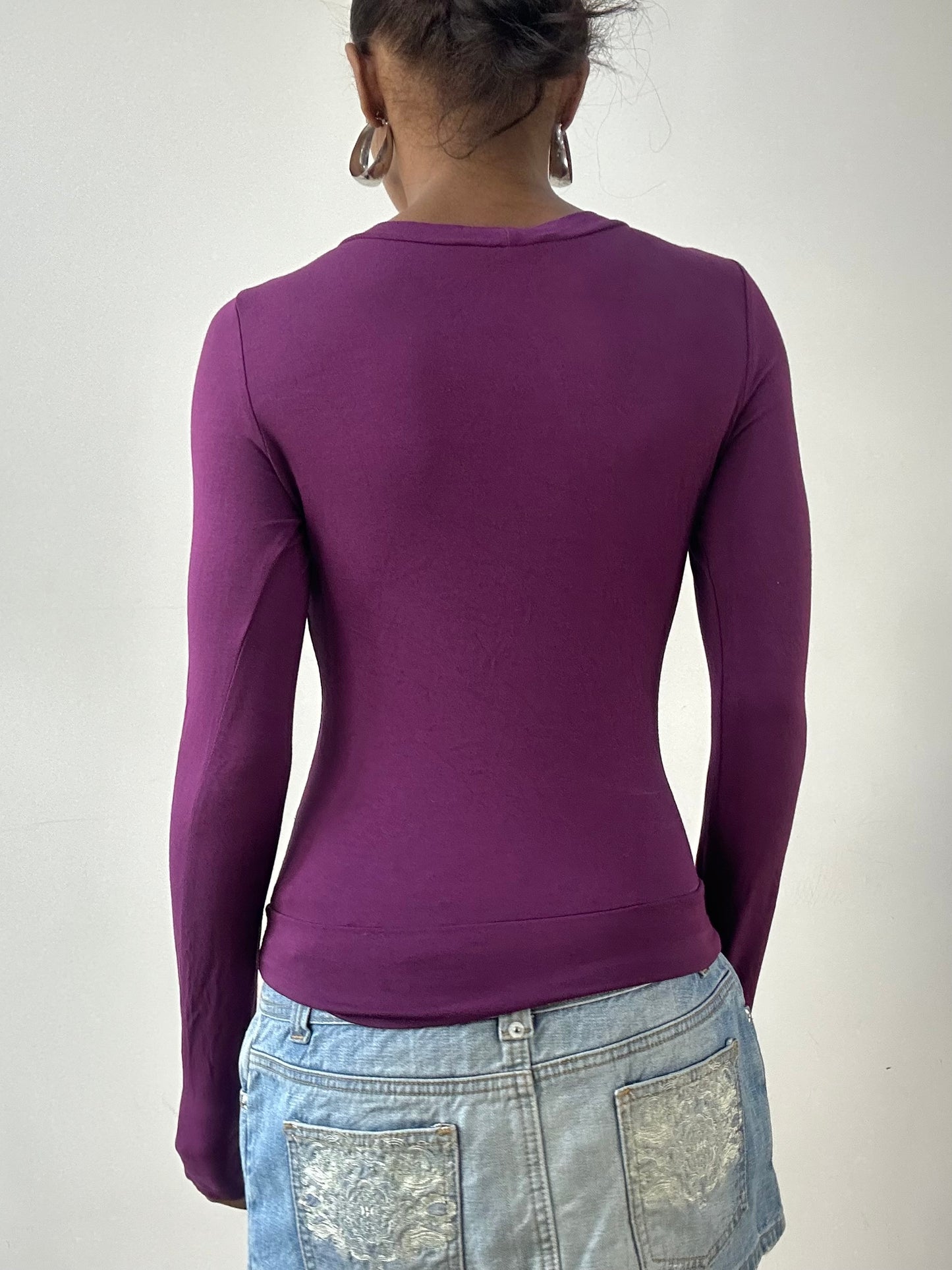 LFW edit | small purple long sleeve wrap style top with bandeau underlay