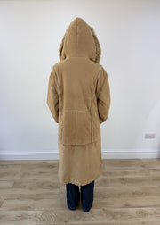 small tan afghan coat