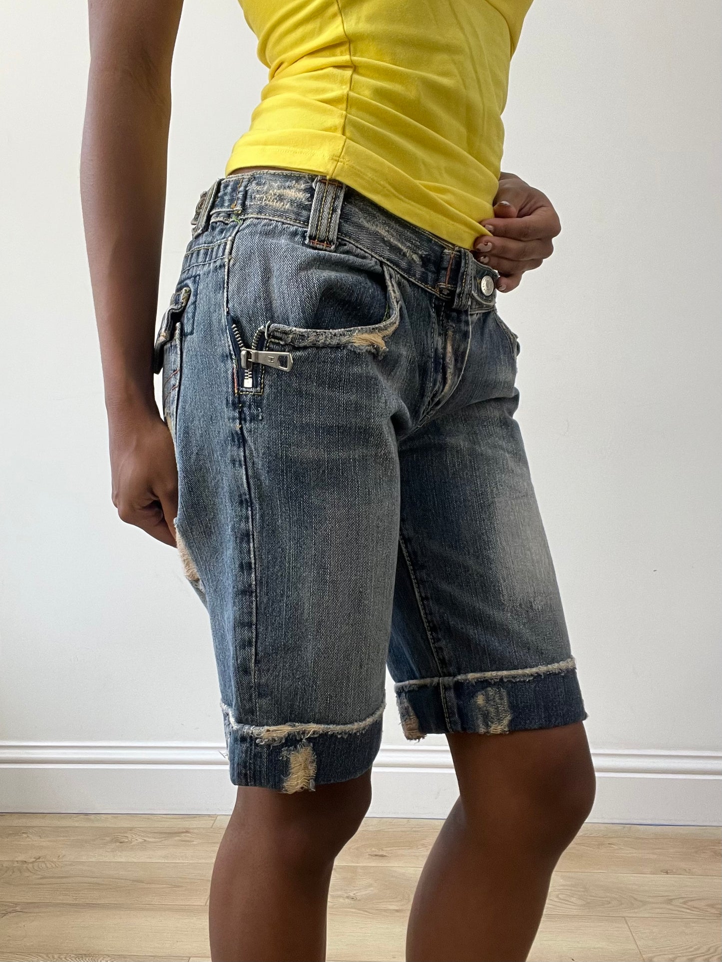 BEST PICKS | small blue denim distressed shorts with zip detail