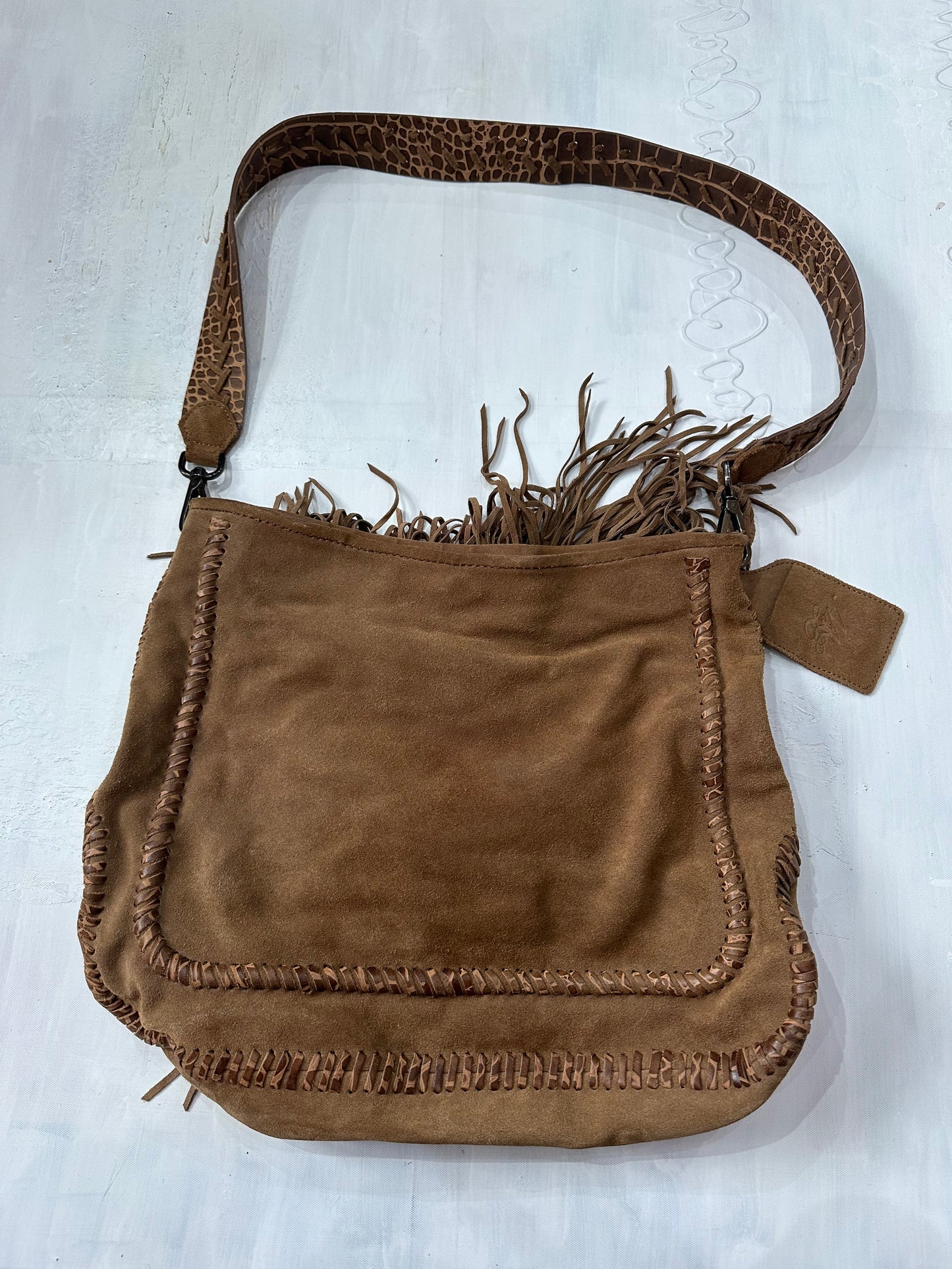 midsummer edit | large brown fringe crossbody bag