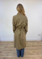 large beige trench coat