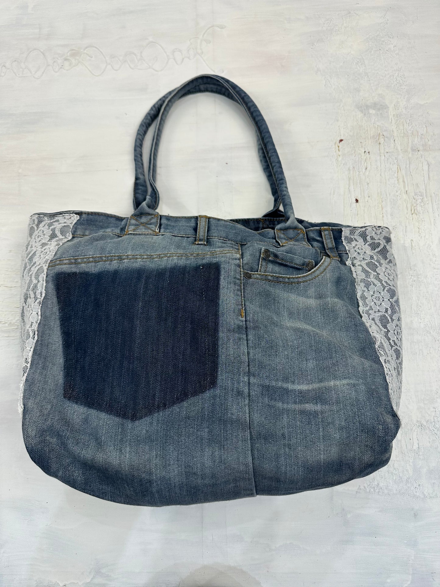 vintage edit: indie sleaze | blue denim tote bag with lace details