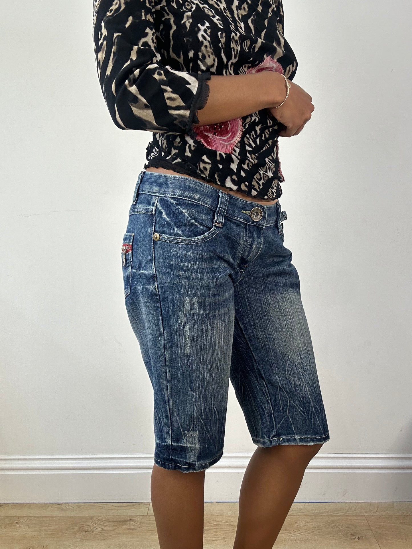 vintage edit eighteen | small blue denim embroidered shorts / capris