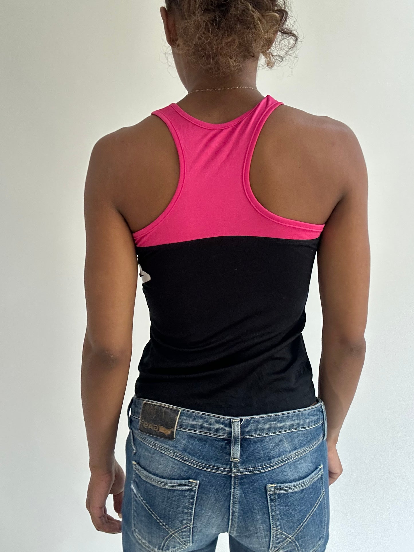 BEST PICKS | small black and pink fitted vest