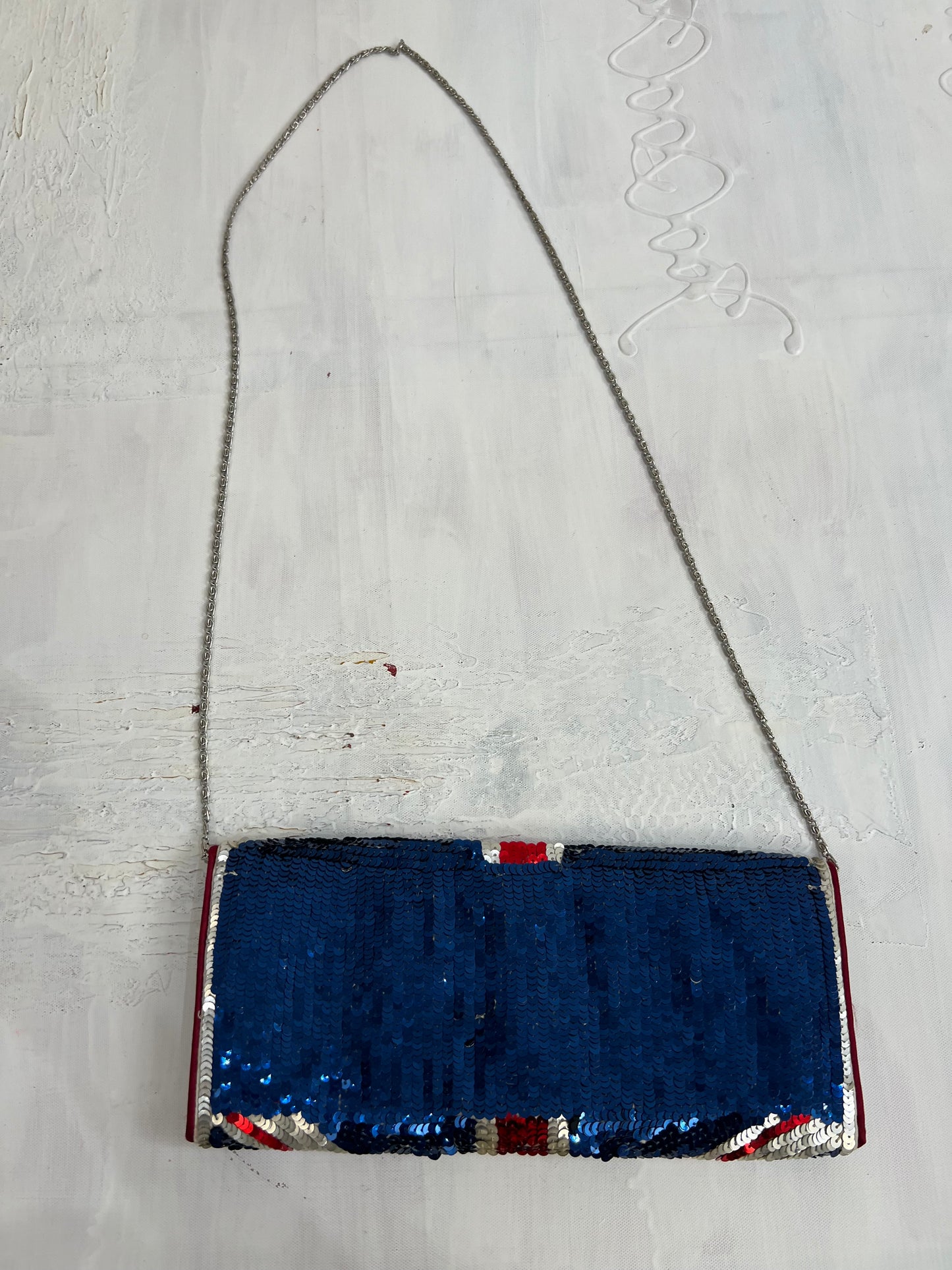 vintage edit thirty | navy and red sequin crossbody bag with british flah print