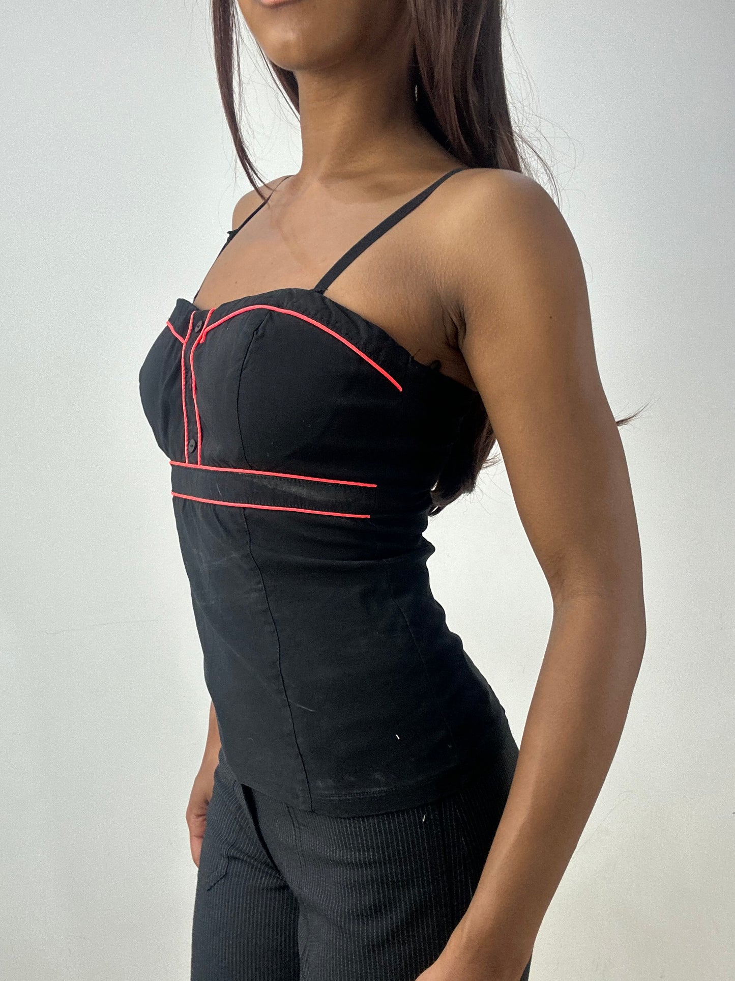 BEST PICKS | small black corset style top with red piping details