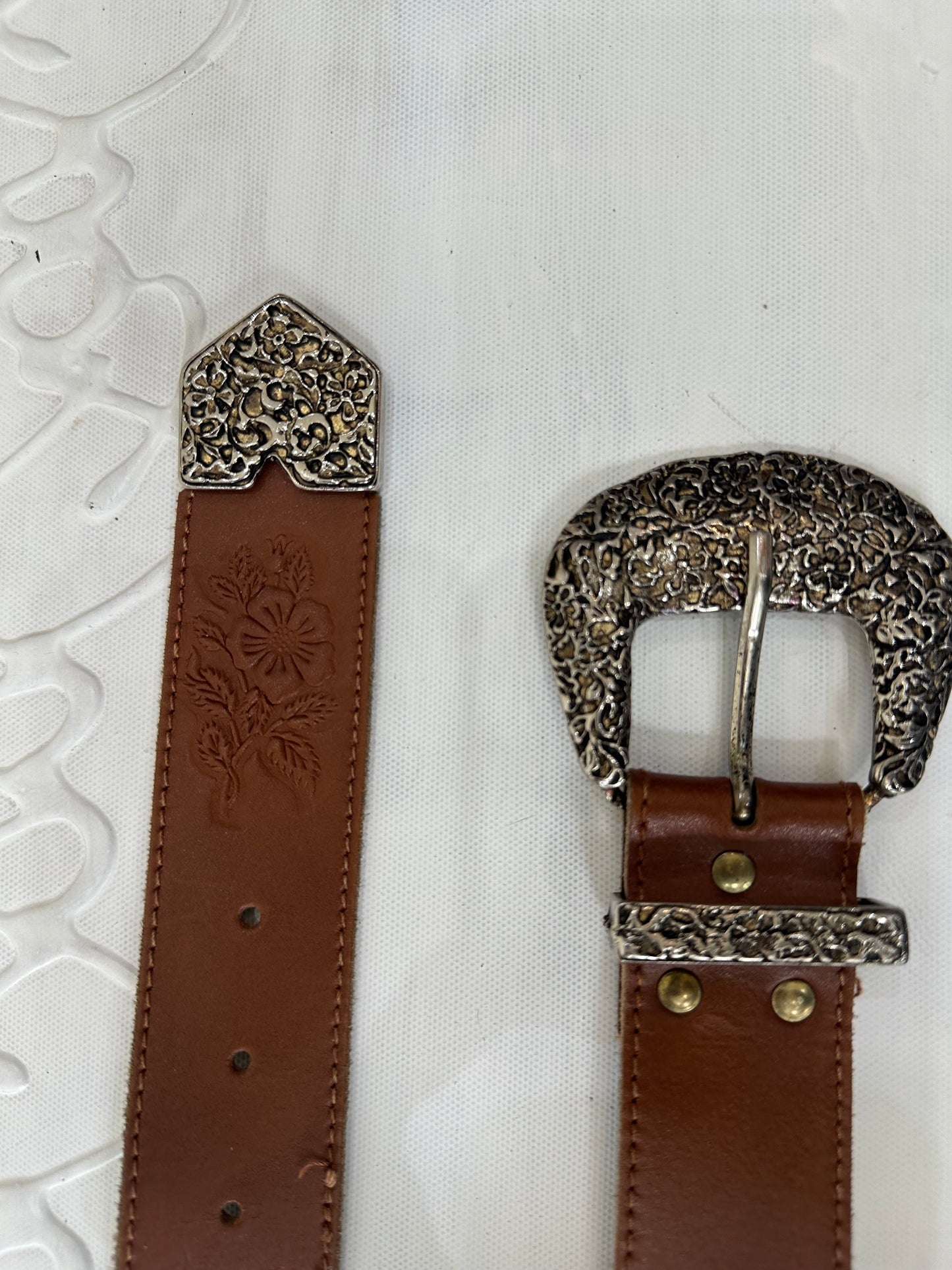 vintage edit twenty-seven | brown and silver buckle belt with floral embossing detail
