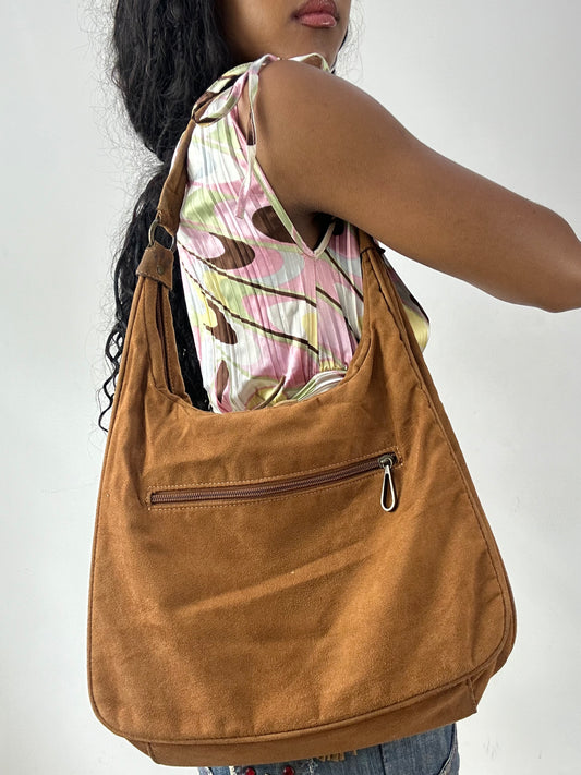 vintage edit twenty-five | brown saddle shoulder bag with tassel detail zips