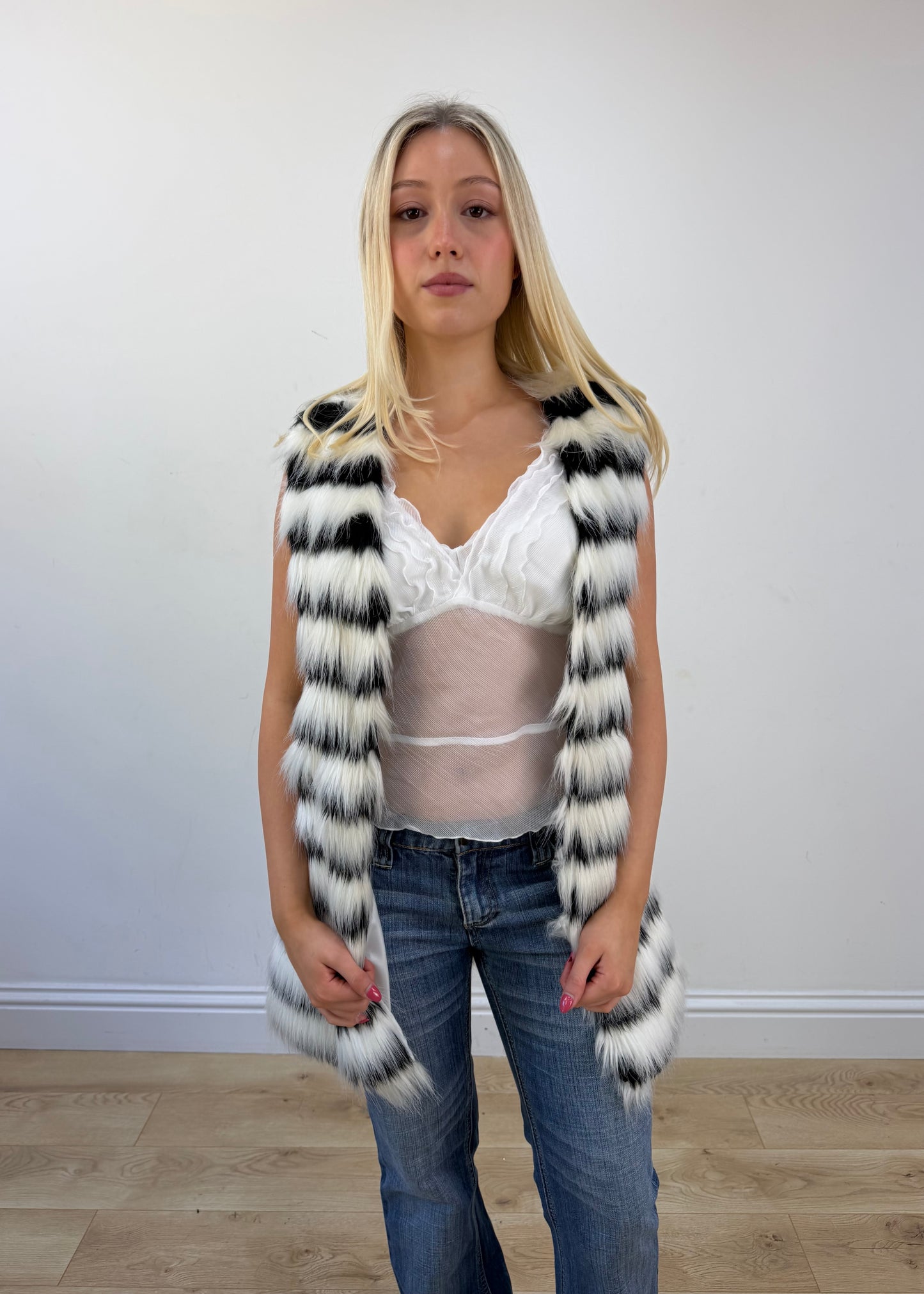 medium white and black faux fur gilet