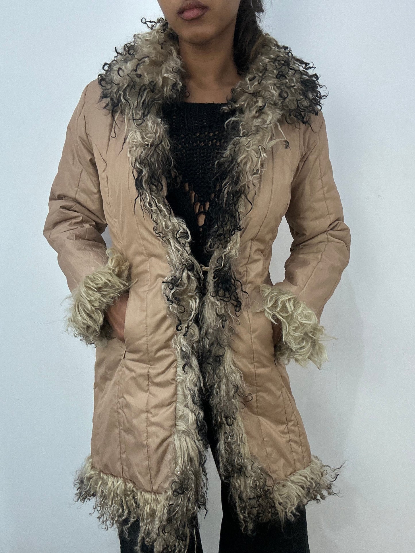 BEST PICKS | small beige quilted puffer jacket with afghan fur details