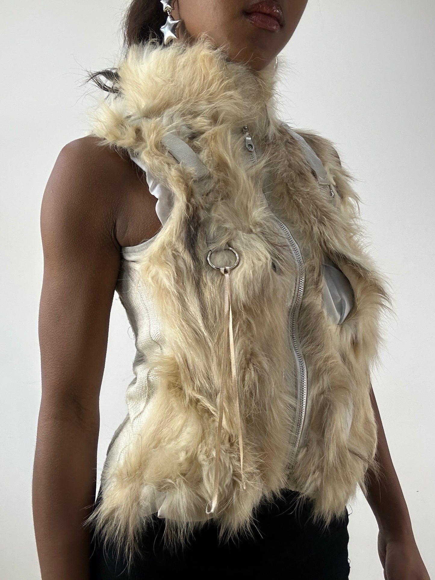 BEST PICKS | small beige fur gilet with distressed details