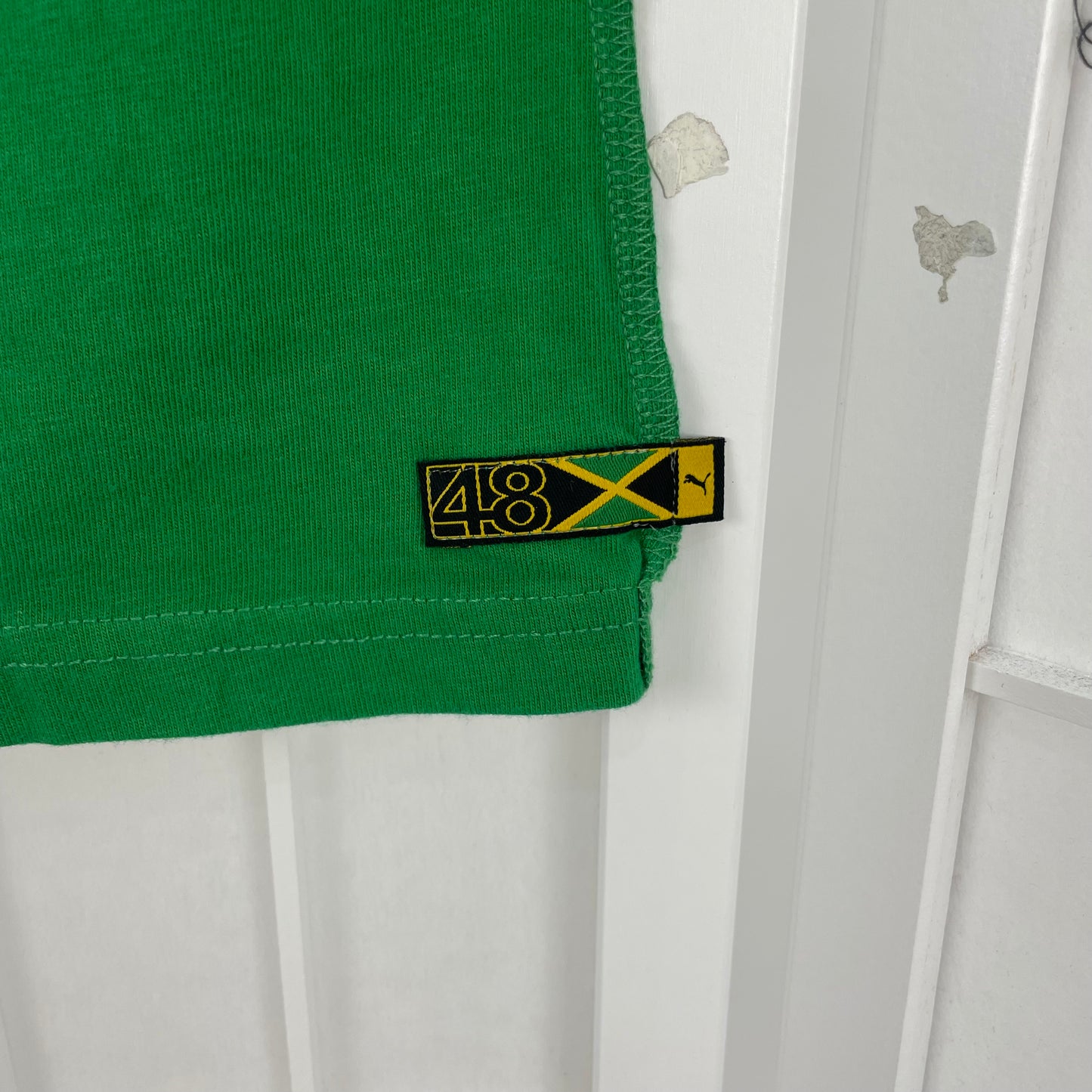 VINTAGE GEMS DROP | green puma “jamaica” vest top