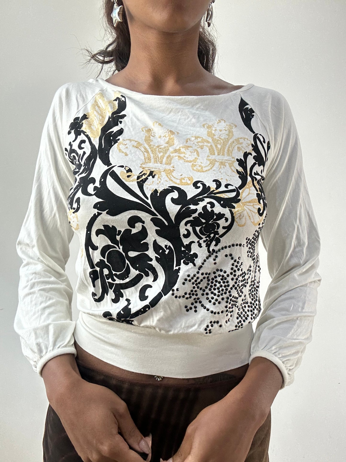 BEST PICKS | medium white long sleeve top with graphic print