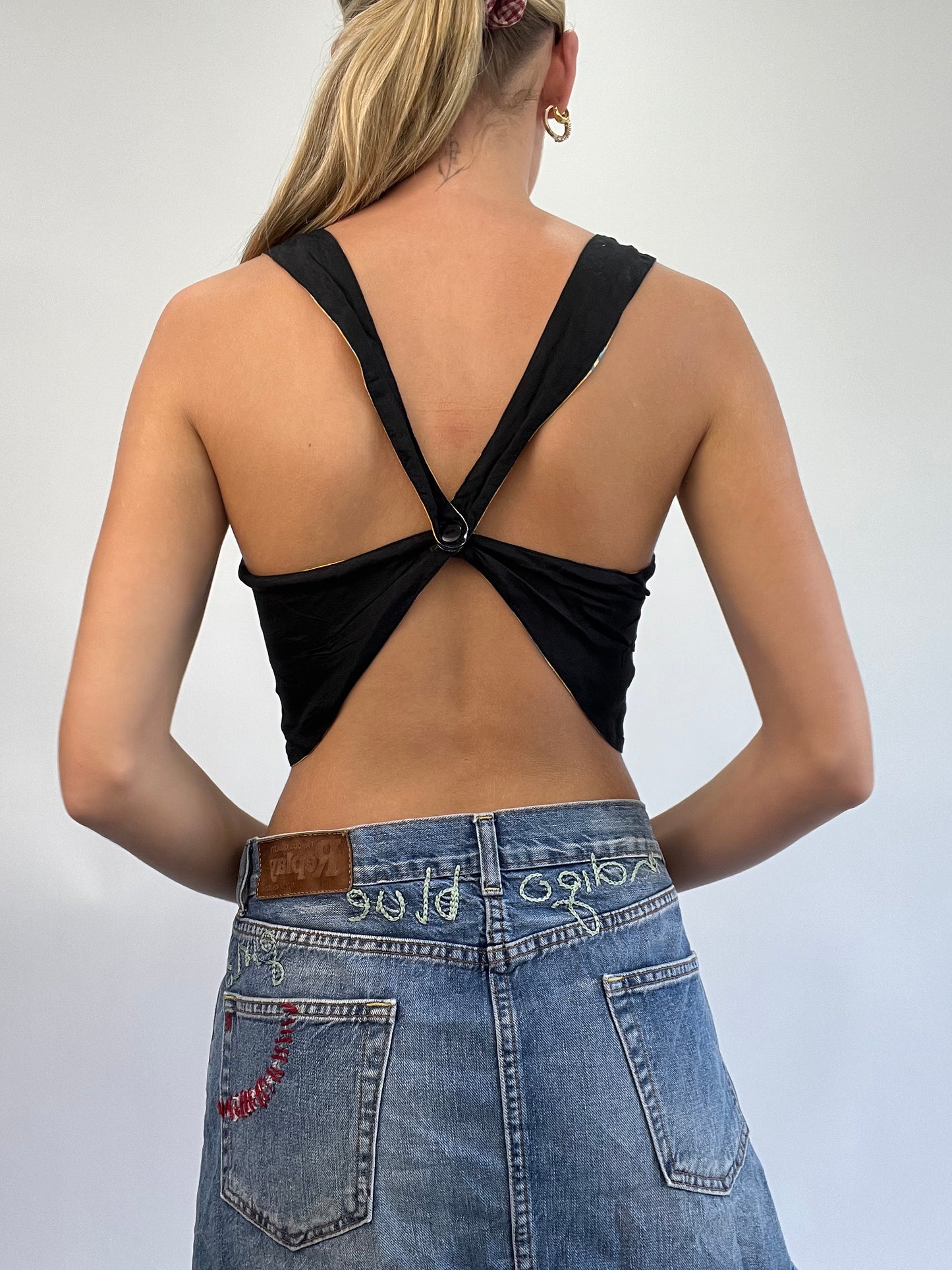 COASTAL COWGIRL DROP | small yellow reversible cropped top with blue floral print