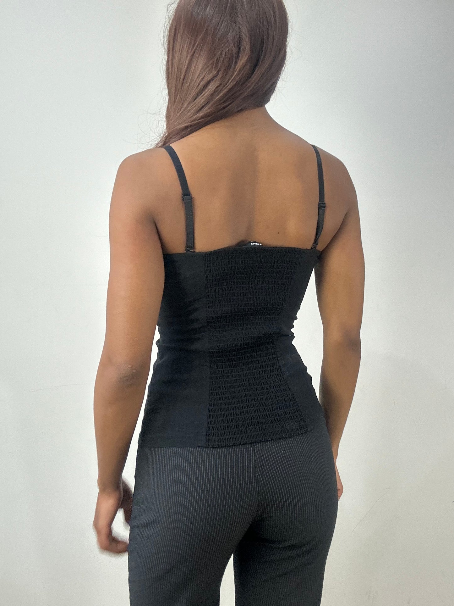 BEST PICKS | small black corset style top with red piping details