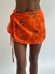 BEST PICKS | small orange patterned beach wrap skirt