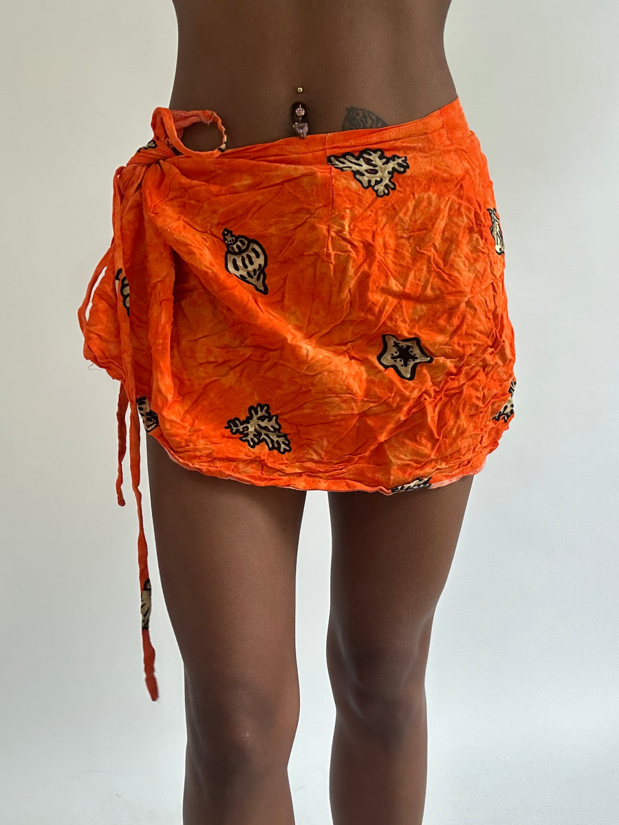 BEST PICKS | small orange patterned beach wrap skirt