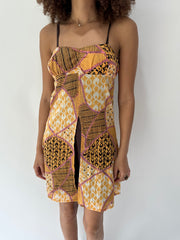 festival drop | taille: S/M · couleur: orange · article: robe · détails: à motifs + longueur mini