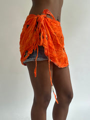 BEST PICKS | small orange patterned beach wrap skirt