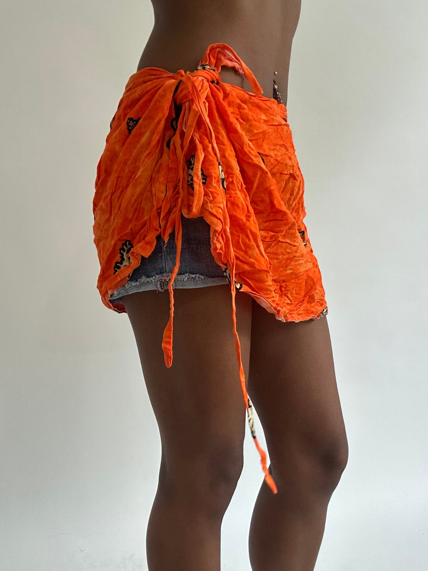 BEST PICKS | small orange patterned beach wrap skirt