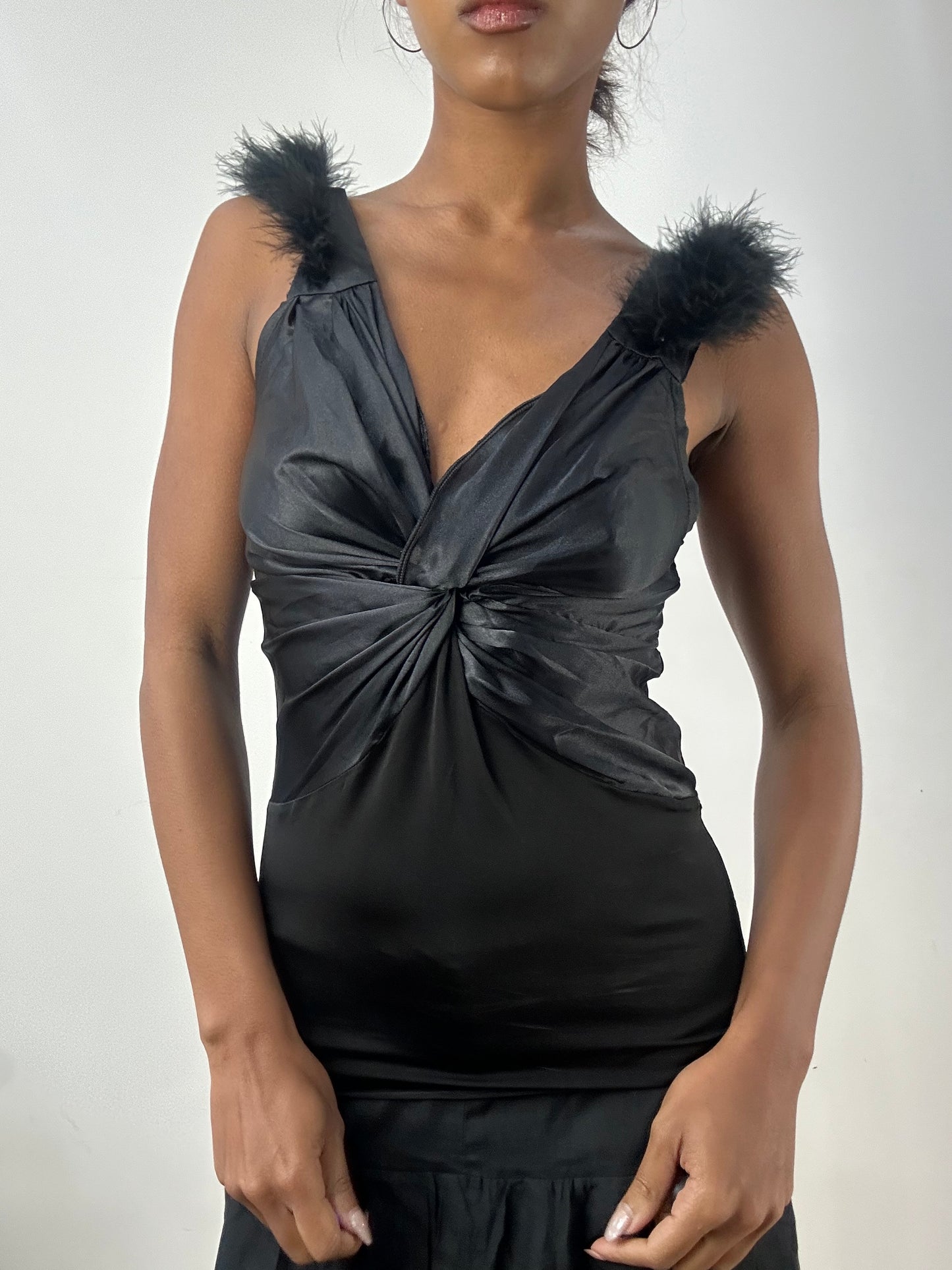 BEST PICKS | small black fitted vest top with faux fur straps