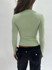 ‼️ | small green long sleeve top with ‘playground’ writing