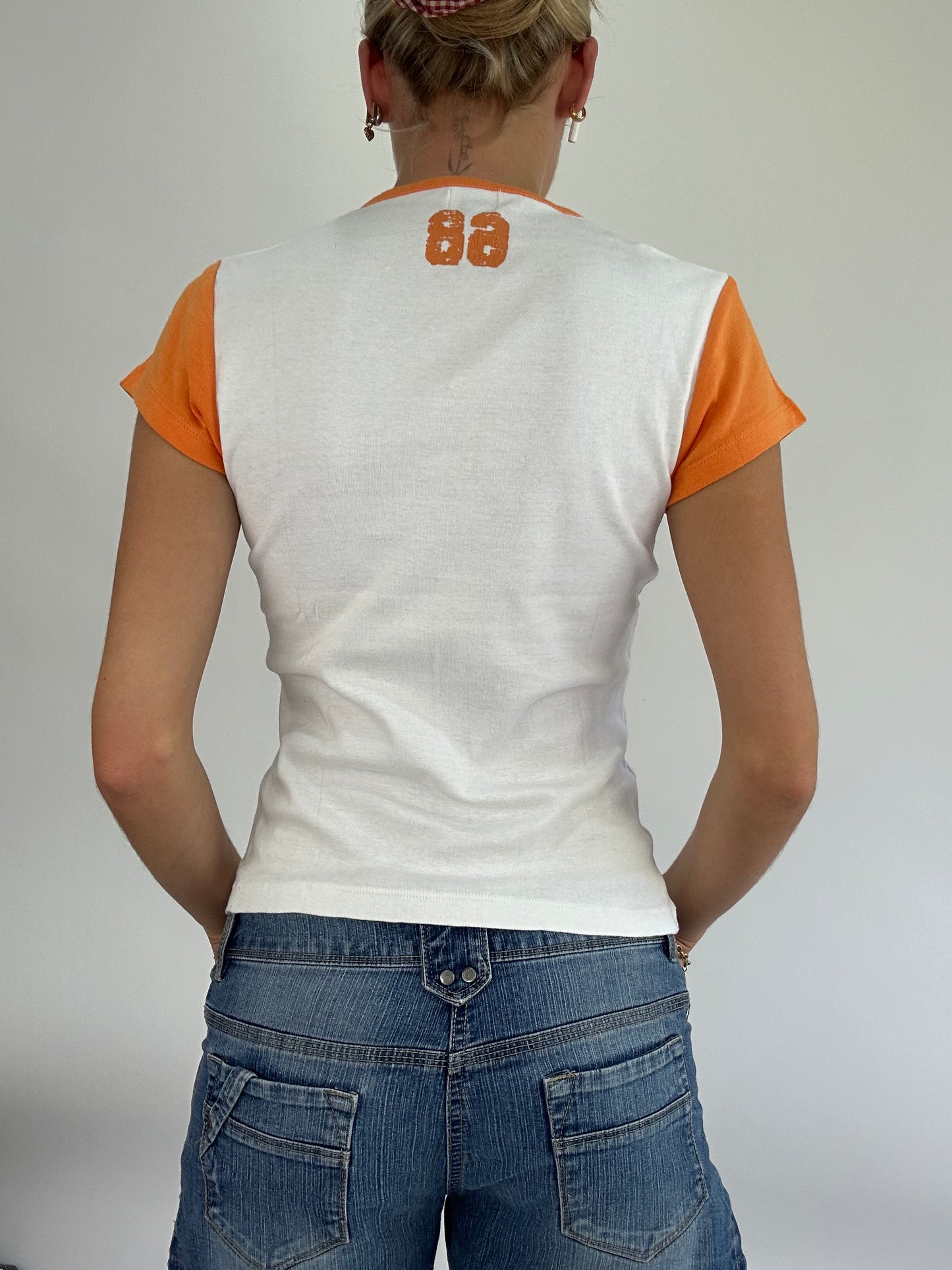 BRITISH SUMMER GIRL DROP | medium white and orange t-shirt with graphic palm tree pattern