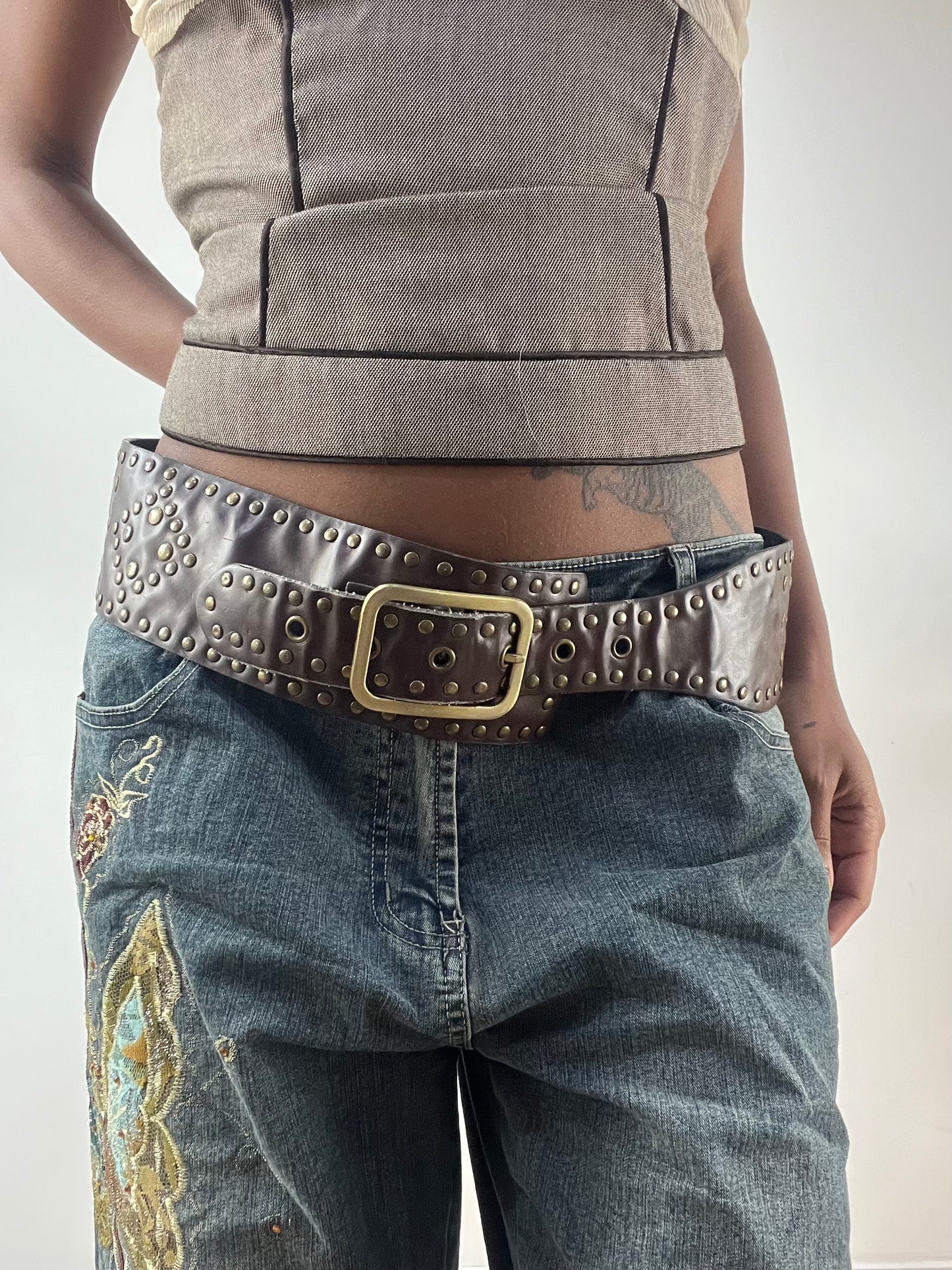 LFW edit | brown statement belt with gold studding and buckle detail