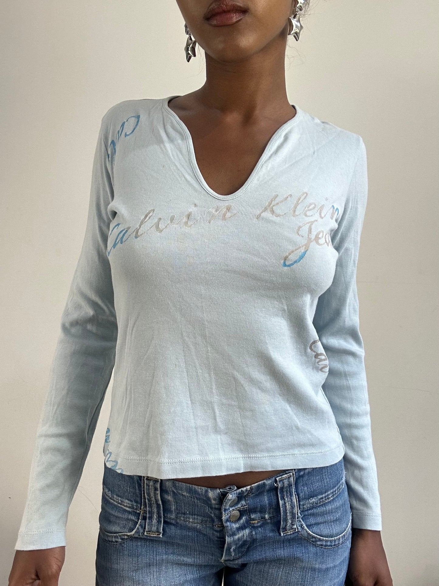 BEST PICKS | small light blue calvin klein long sleeve top
