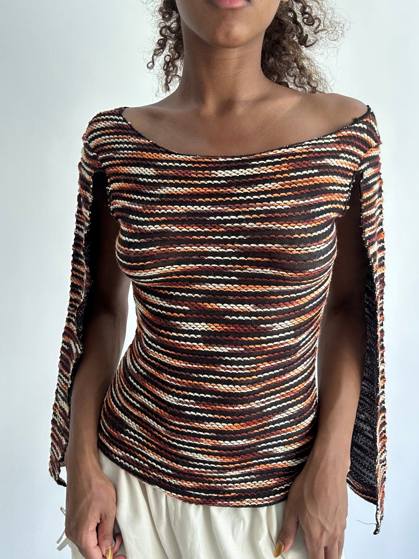 autumn picks | orange and black top with open long sleeves