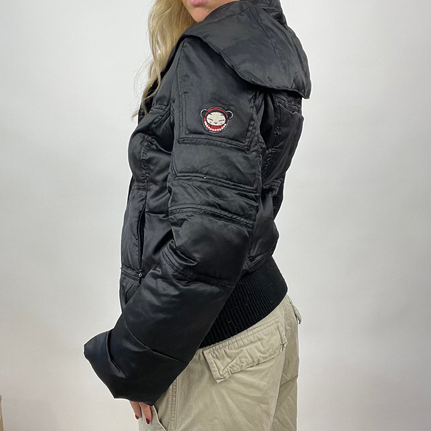 CHALET GIRL DROP | small black padded jacket with girl graphic