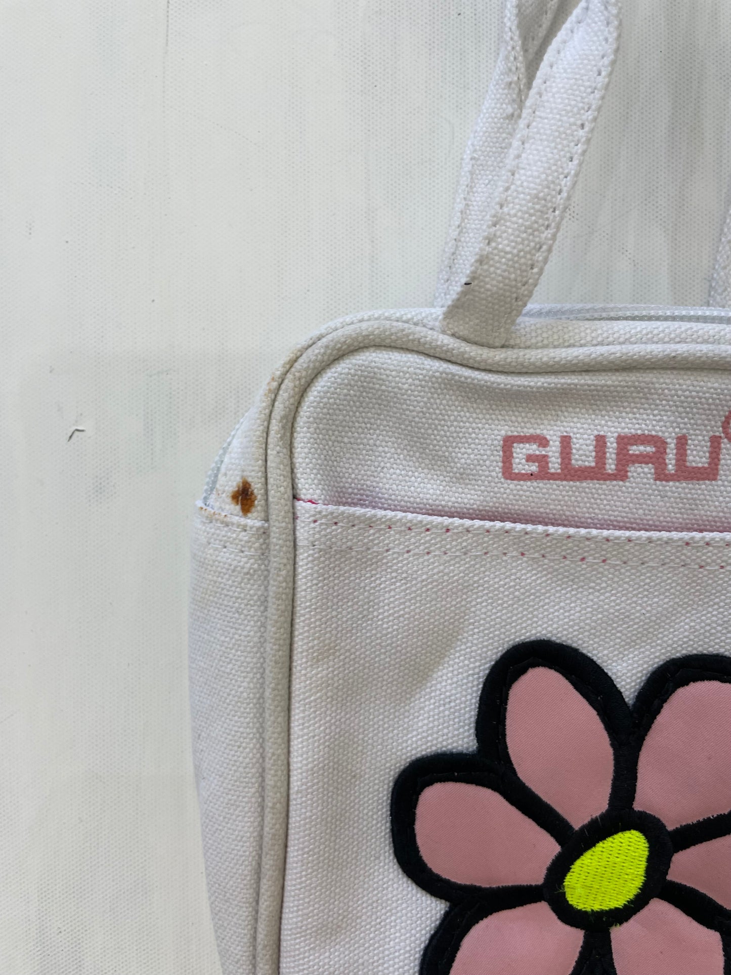VINTAGE PICKS | white clutch bag with floral detailing