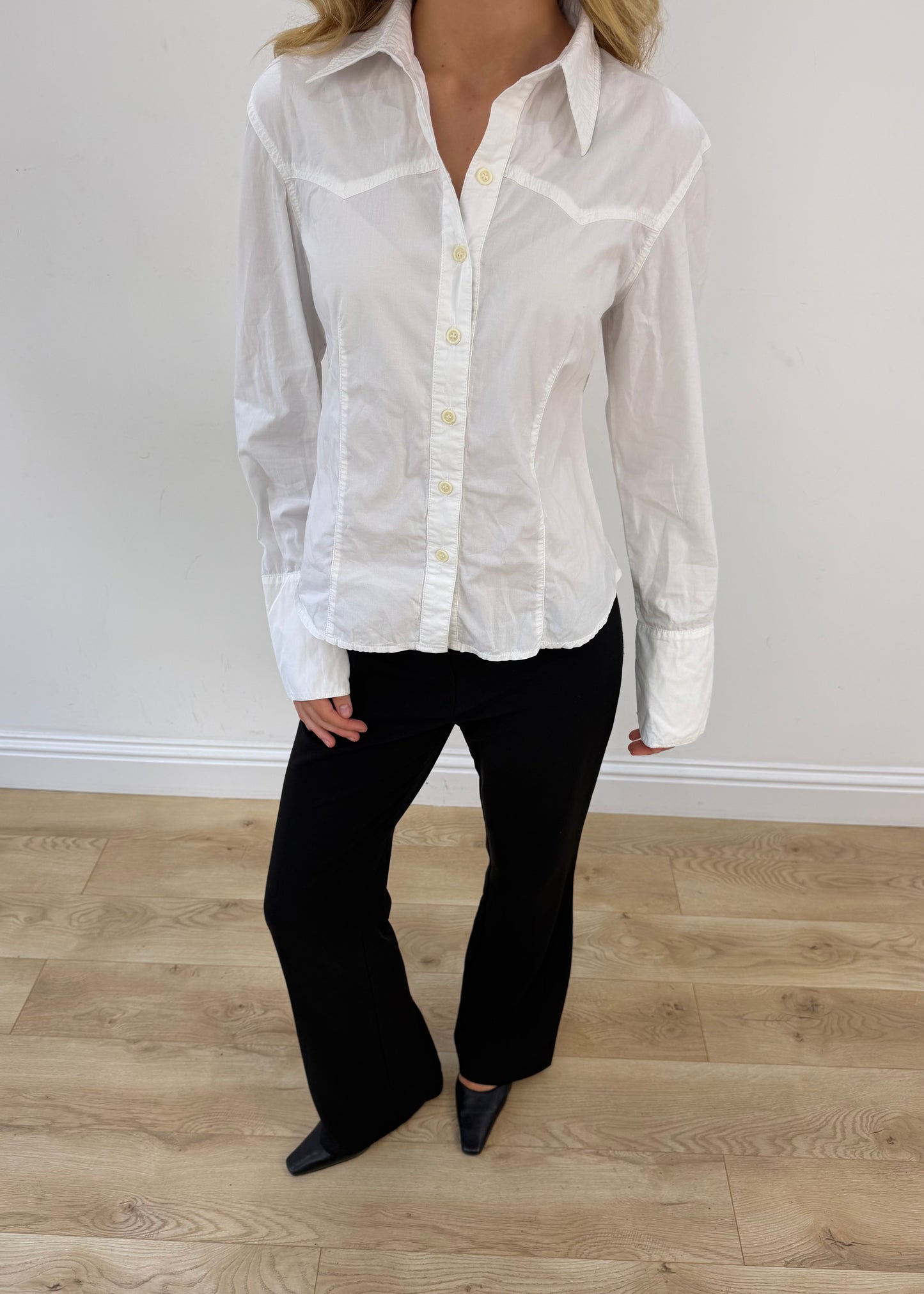 small white button up long sleeve shirt