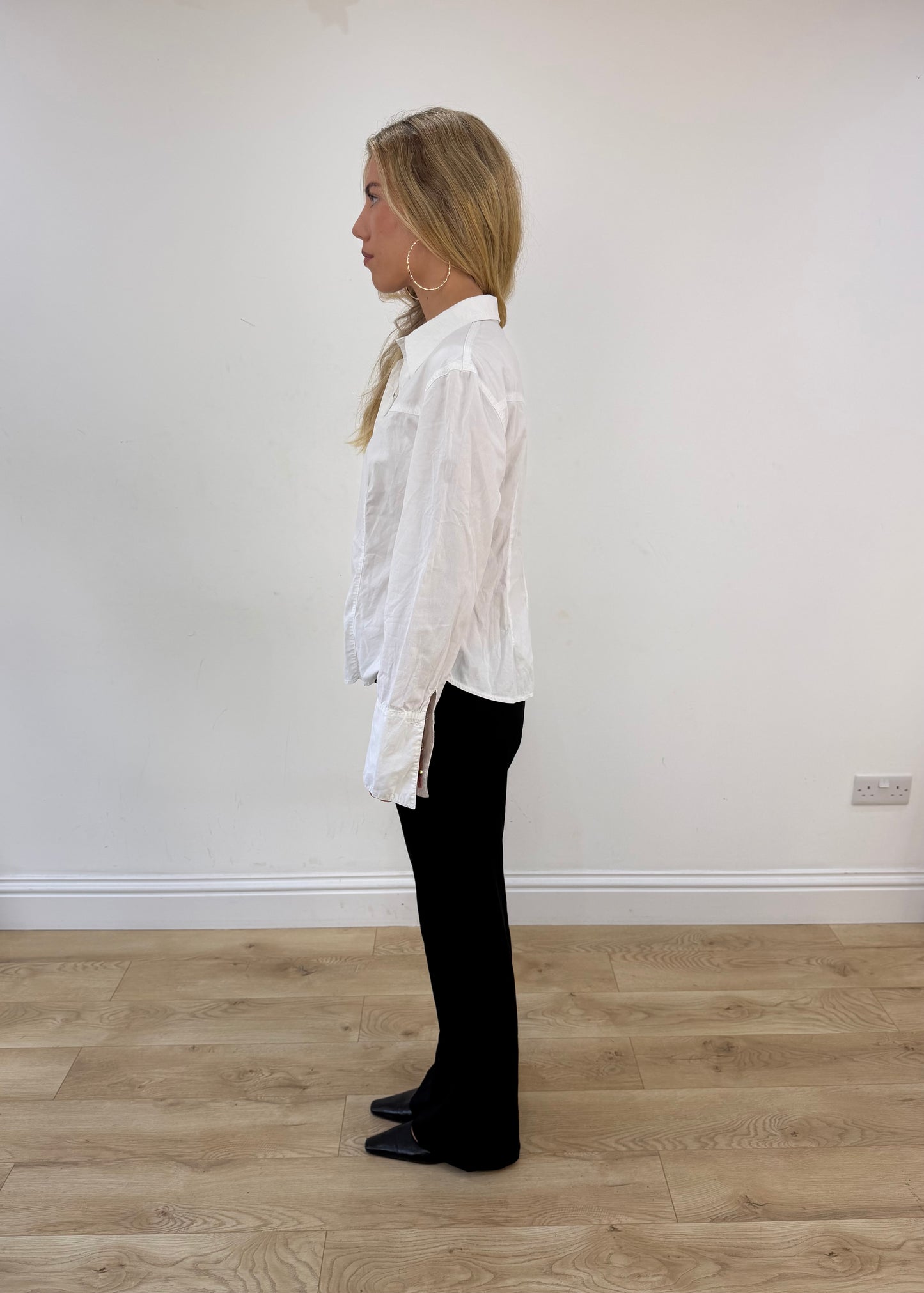 small white button up long sleeve shirt