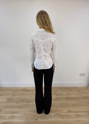 small white button up long sleeve shirt