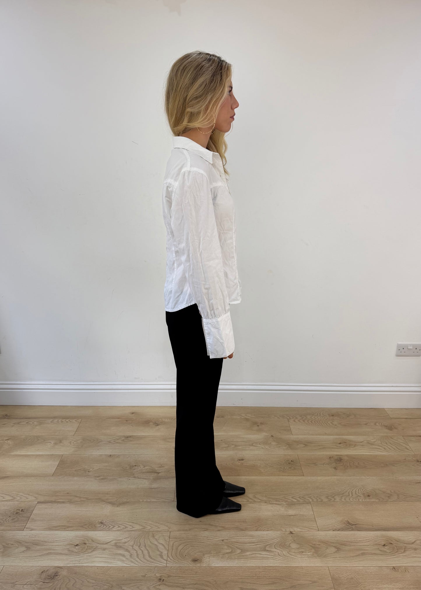 small white button up long sleeve shirt