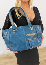 blue shoulder tote bag with silver hardware detail view